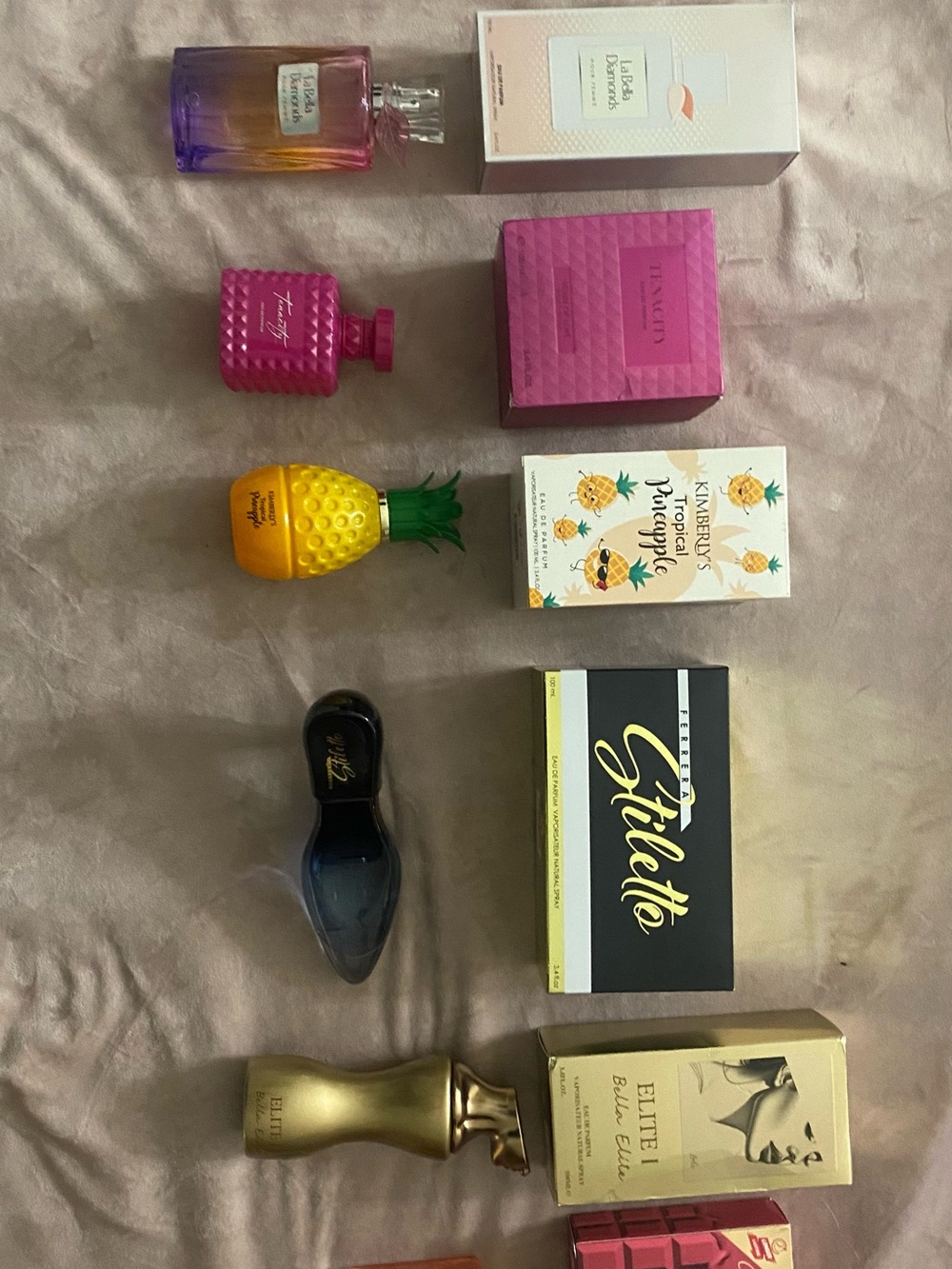 Assorted Women's Fragrance Collection - Pink, Yellow, Purple Bottles